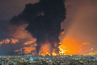 Smoke and flames rise at the site of airstrikes on an oil depot in Tehran on March 7, 2026. Photo: Sasan/MEI/SIPA/ANP